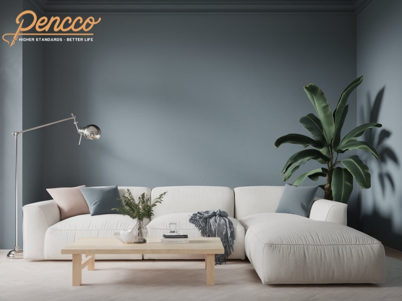 Phòng khách Scandinavian với cây lớn và gối trang trí